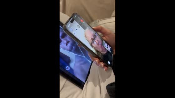 Woman pranks her mom with a video call featuring a random man in London, England, UK