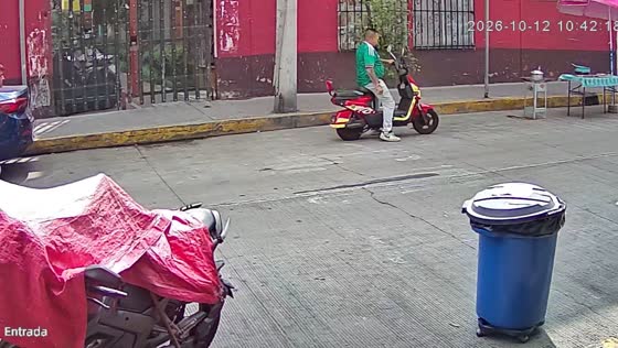 Van hits hand truck carrying wooden planks, sending man into roadside food stall in Mexico