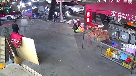 Surveillance video captures car hitting motorcycle in Wenzhou, China