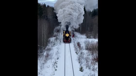 Steam locomotive decorated approaching in Kirov
