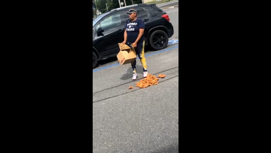 Box of fried chicken falls outside of ACME store in Clayton, New Jersey, USA