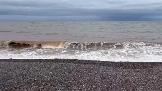 Stormy high-tide waves at Keating Sand Beach, Nova Scotia, Canada