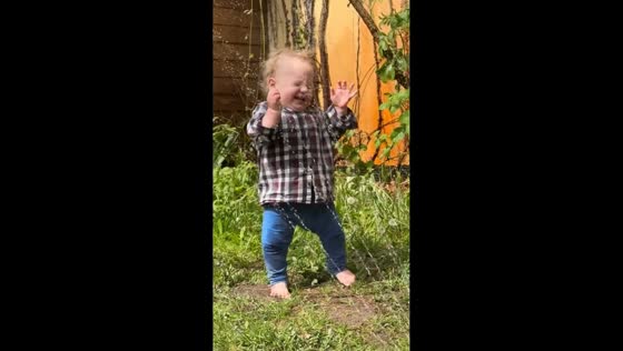 Little boy hilariously reacts to garden sprinkler in Berlin, Germany