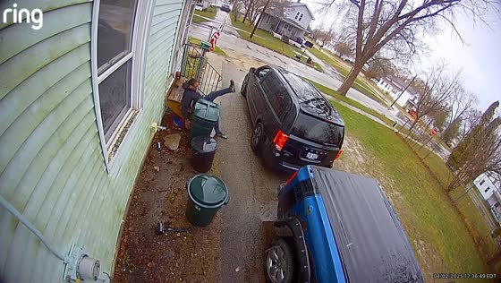 Man slips on wet stairs and falls outside home in Saginaw, Michigan, USA