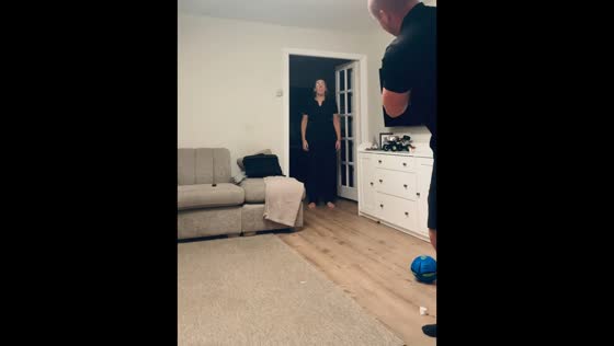 Couple plays marshmallow golf indoors in Accrington, England, UK