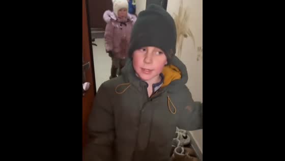 Children return home covered in mud and start cleaning in Maladzyechna, Belarus