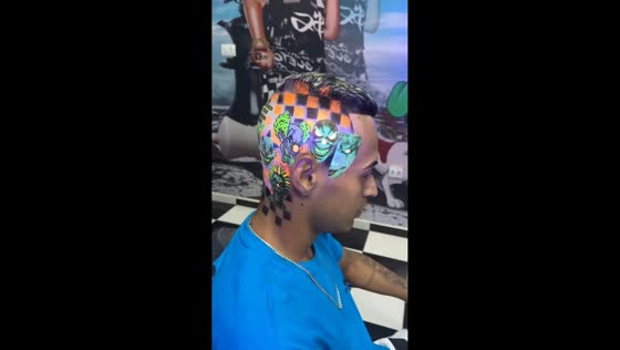 Fluorescent hair art showcases creative designs in Aguaí, Brazil