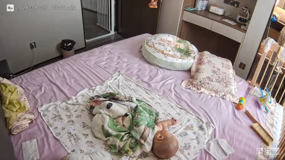 Dog drops its toy beside a sleeping baby in Shaanxi, China