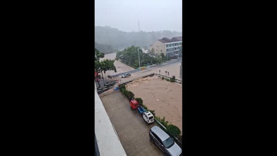 River overflows and floods nearby residential area in Taizhou, China