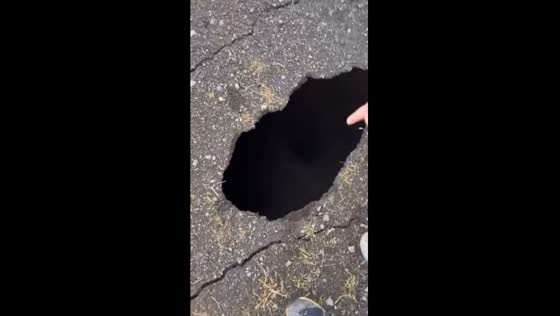 Grindavík's quake unleashes havoc with massive hole on the road