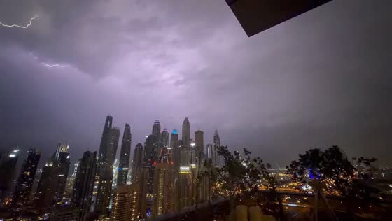 Lightning illuminates skyline during thunderstorm in UAE