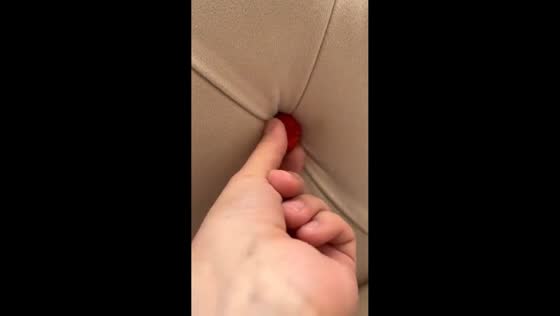 Toddler proudly hides snacks in couch gaps in Diyarbakır, Turkey