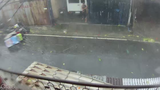 Strong winds overturn tricycle during rainstorm in Mandaluyong, Philippines