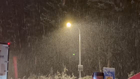 Heavy snowfall turns Highway 80 into a winter scene in California, USA