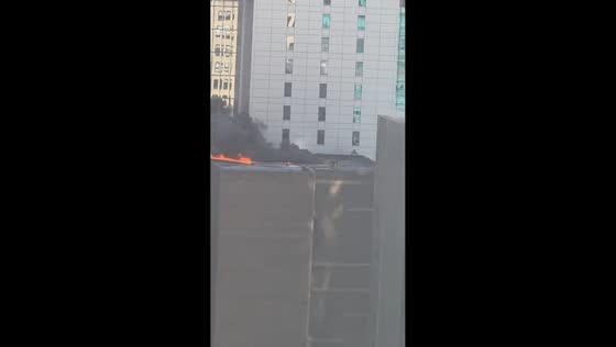 Midtown high-rise fire sends thick smoke over Manhattan skyline in New York, USA