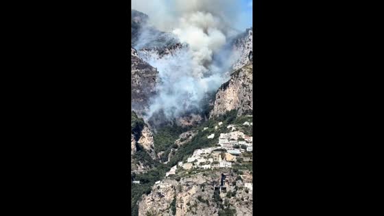 Wildfire sends massive smoke plume over Amalfi Coast in Amalfi, Italy
