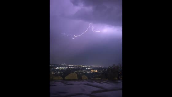 Jagged lightning bolt illuminates powerful thunderstorm over Provo, USA