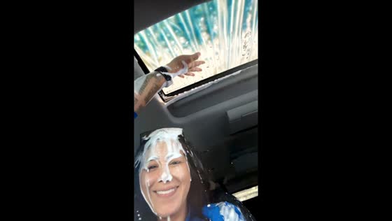 Car leaks during tidal wave car wash due to tilted sunroof in Minot, North Dakota