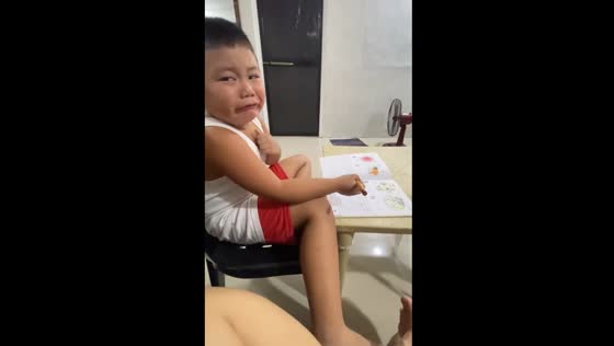 Child's first school homework brings tears in Mabalacat, Philippines