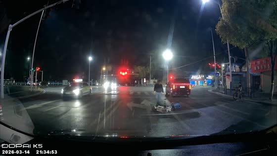 Scooter rider collides with car on main road in Jiangxi, China