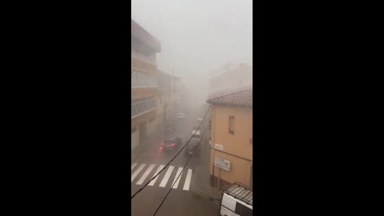 Sudden torrential downpour brings near-whiteout conditions to Olot, Spain