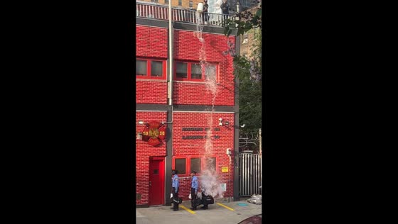 Firehouse prank sees recruits soaked by senior firefighters in New York, USA