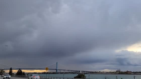 Lake-effect rain clouds loom over Windsor highway, Ontario, Canada