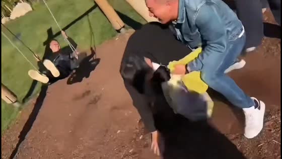 Man nearly trips after being pulled into a swing's motion at a playground in Hebei, China
