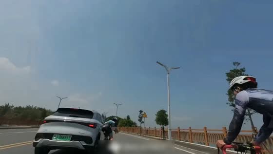 Car hits cyclist and crashes into streetlight pole in Guangdong, China