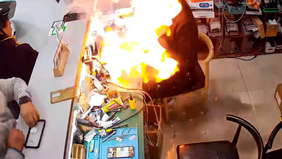 Mobile phone battery explosion caught on camera during repair