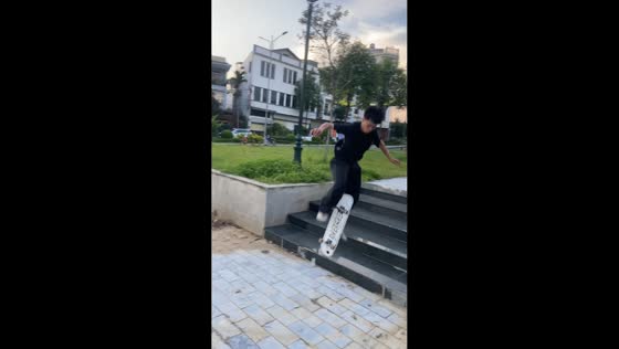 Skateboarder falls while attempting stair trick in Tuyên Quang, Vietnam