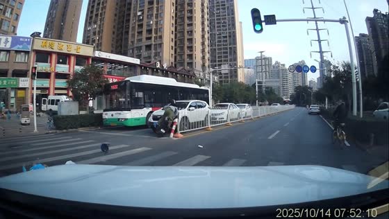 Motorcycle collides with scooter at pedestrian crossing in Hubei, China