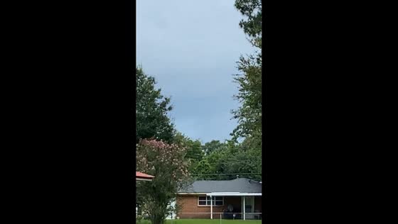 Funnel cloud begins forming during storm in Gonzales, Louisiana