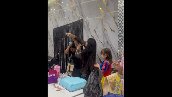 Women smear each other with cake in Leon, Mexico