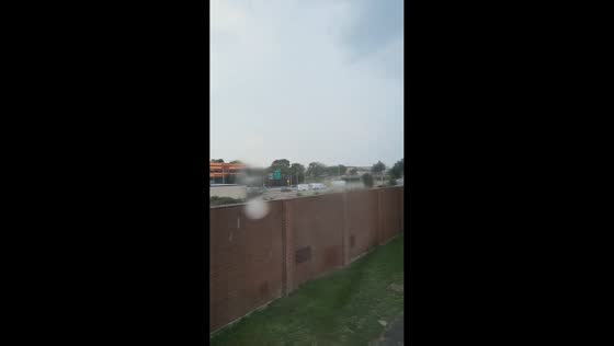 Steady summer rain creates moody scene in South Boston, USA