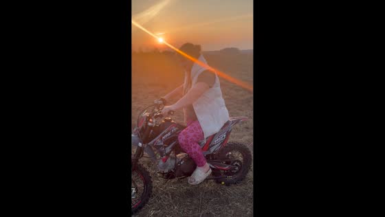 Woman loses control while practicing on dirt bike in Guta, Belarus