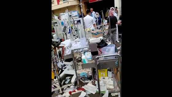 A lot of injured people near the hospital after the earthquake in Indonesia