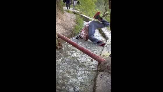 Daredevil handstand fail in Jammu stream