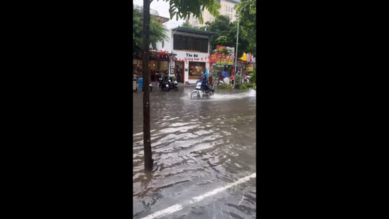 Streets submerged as Typhoon Kajiki hits in Hanoi, Vietnam