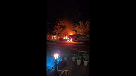 Backyard fire damages camper in Bryan, Ohio, USA