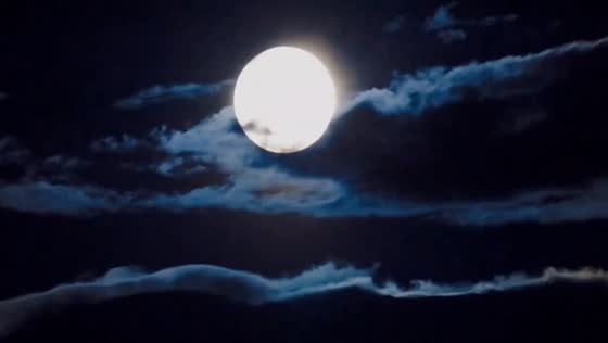 Spooky full moon rises over Magna, Utah