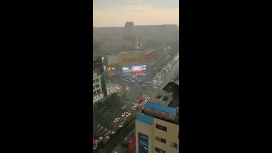 Metal sheets fall onto cars during traffic jam in Zhucheng, China