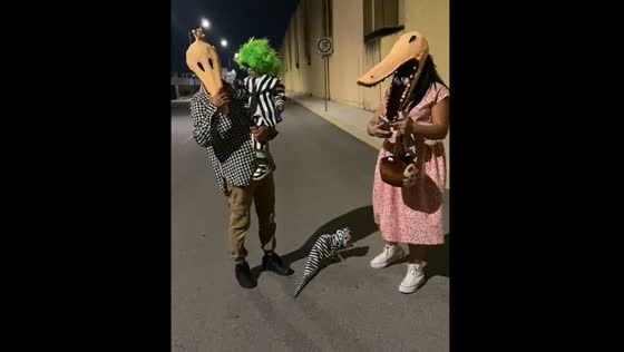 Family and dog in Halloween costumes in Real Granada, Mexico