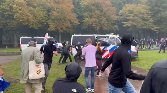 Dutch police clash with anti-immigration protesters in Amsterdam, Netherlands