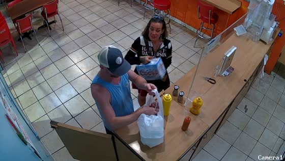 Customers walk out with entire ketchup bottle from restaurant in St. Croix, Virgin Islands, USA