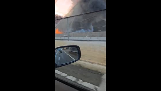 Large roadside fire seen from passing vehicle in Aioi, Hyōgo, Japan