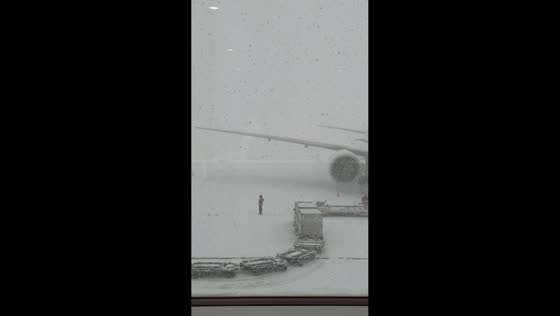 Heavy snowfall disrupts operations at New Chitose Airport in Hokkaido, Japan