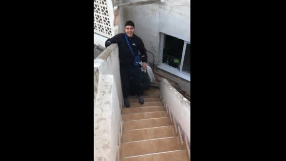 Person breaks roofing while retrieving ball in Pilar de la Horadada, Spain