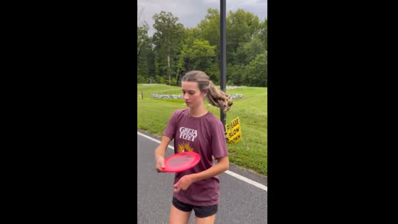 Disc golf blooper: Amy's accidental ace in the wrong basket!