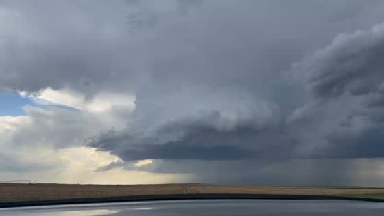 Massive storm cloud dominates sky over Kansas, USA